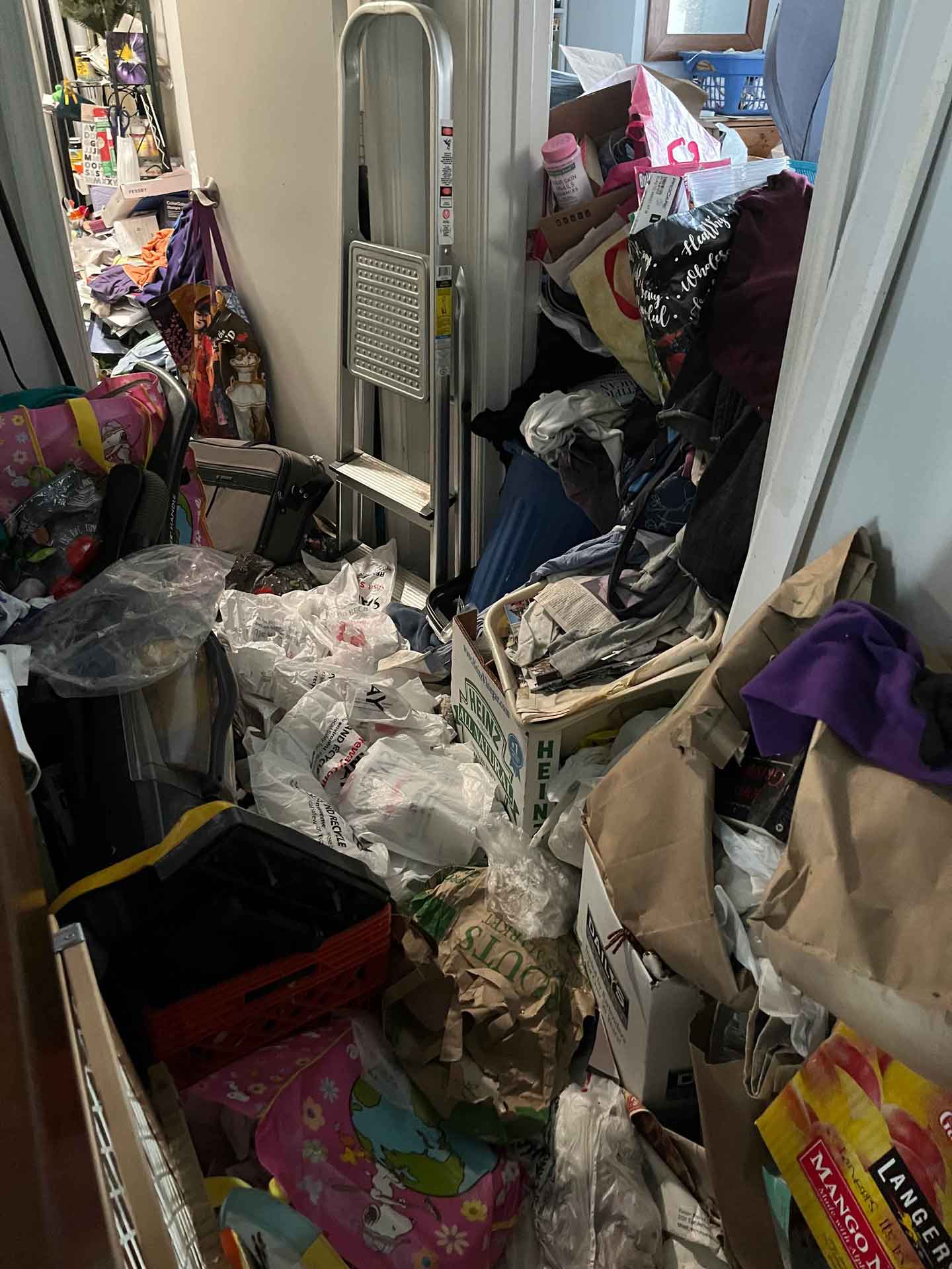 Piles of junk in hoarder's house
