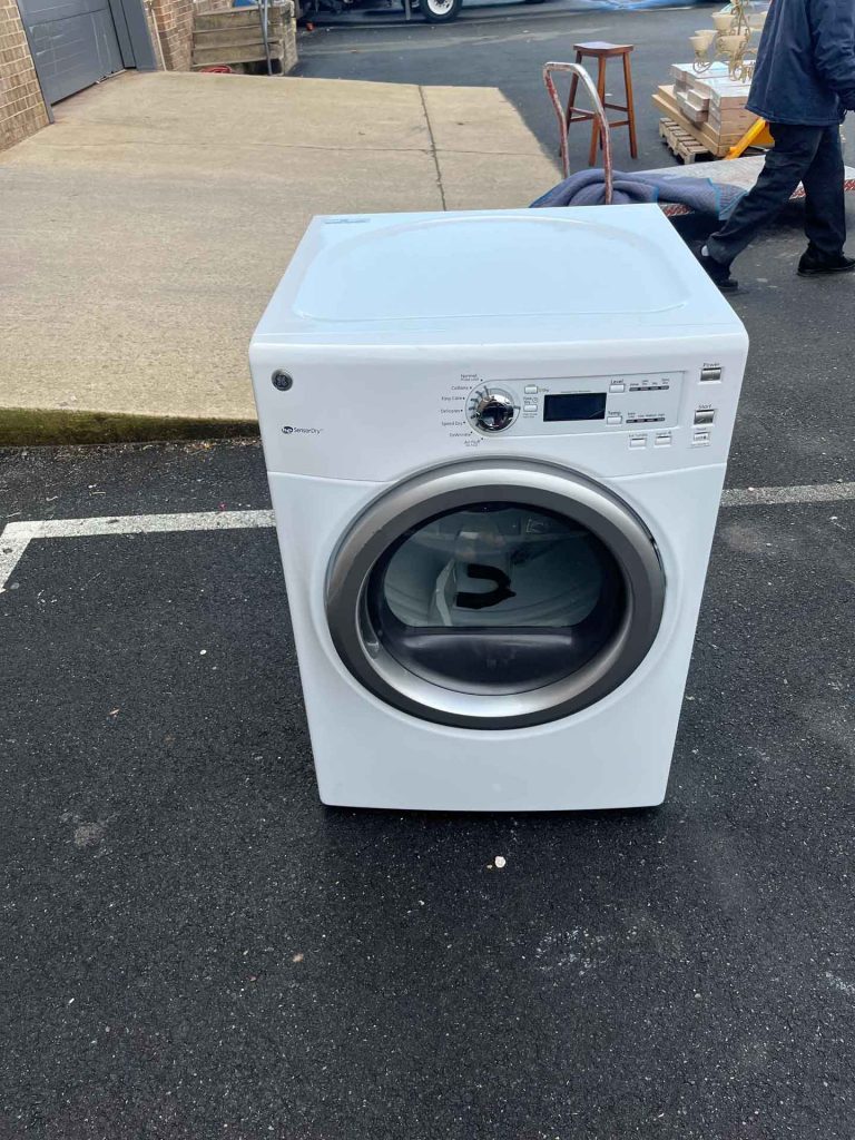 Old washing machine appliance to be removed by Junk Daddy